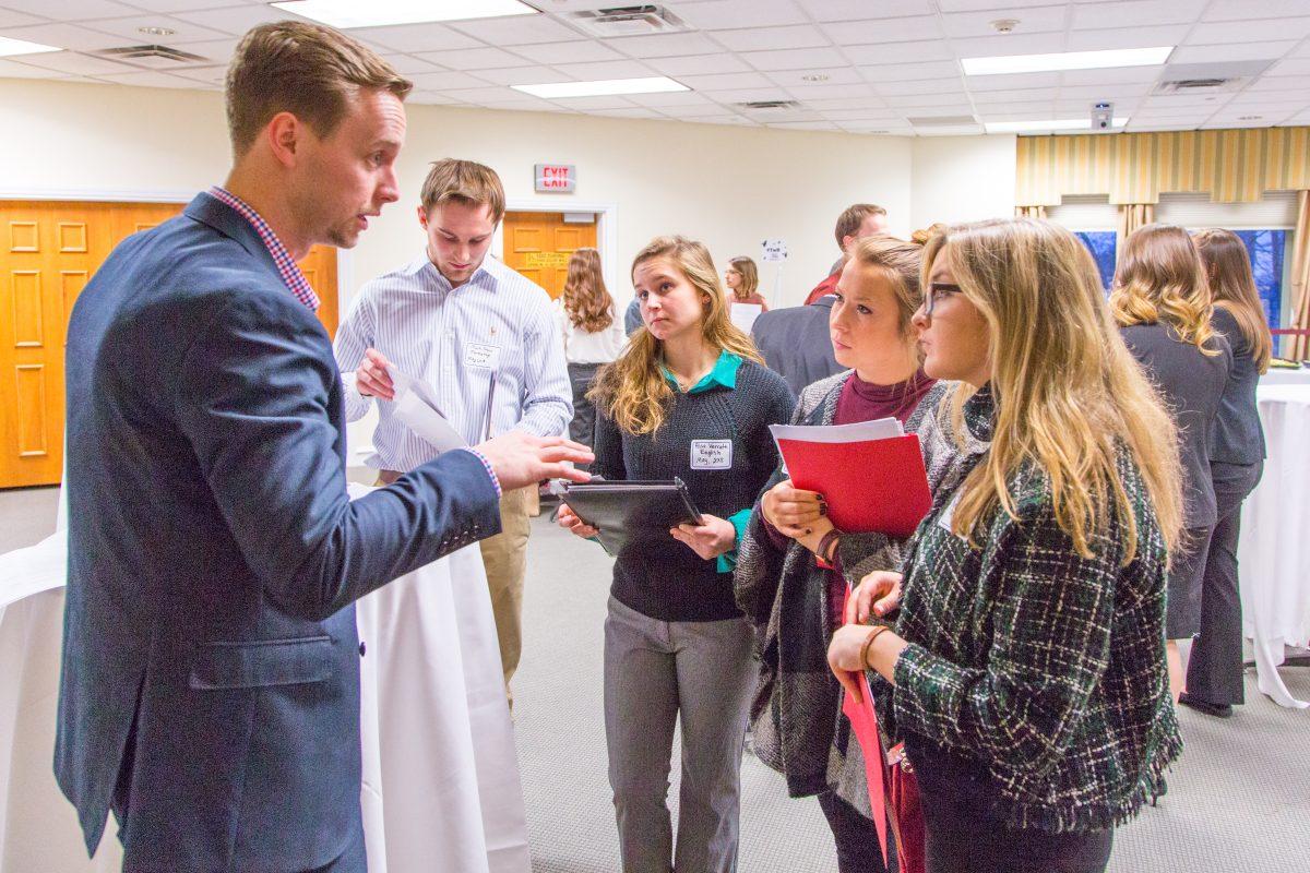 St. Joes students connect with Philadelphia employers and representatives on fifth floor of McShain Hall (Photos by Luke Malanga 20).