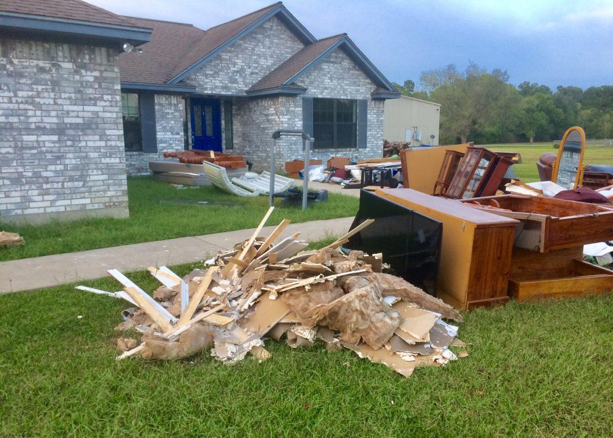 Drywall and water damaged items outside Tyler Hargraves Family Home in Beaumont (Photo courtesy of Tyler Hargraves).