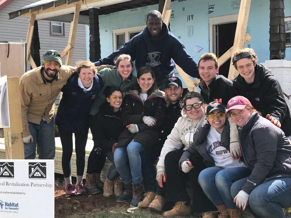 An APEX group poses for a photo at their construction site in 2017. PHOTOS: MEGHAN CORONA ’20