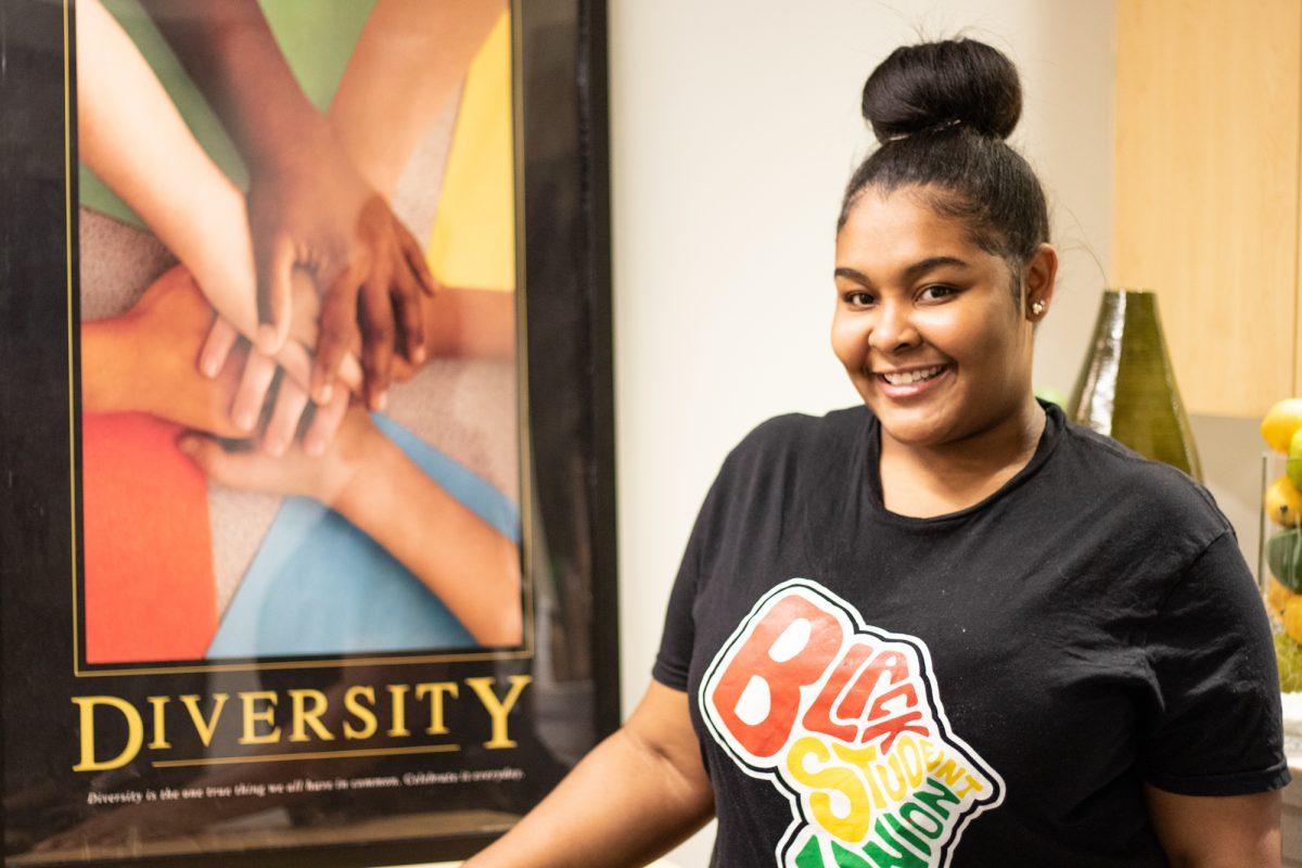 Morris stands in the Office of Inclusion and Diversity where she said she feels most at home on campus. PHOTO: MITCHELL SHIELDS ’22/THE HAWK