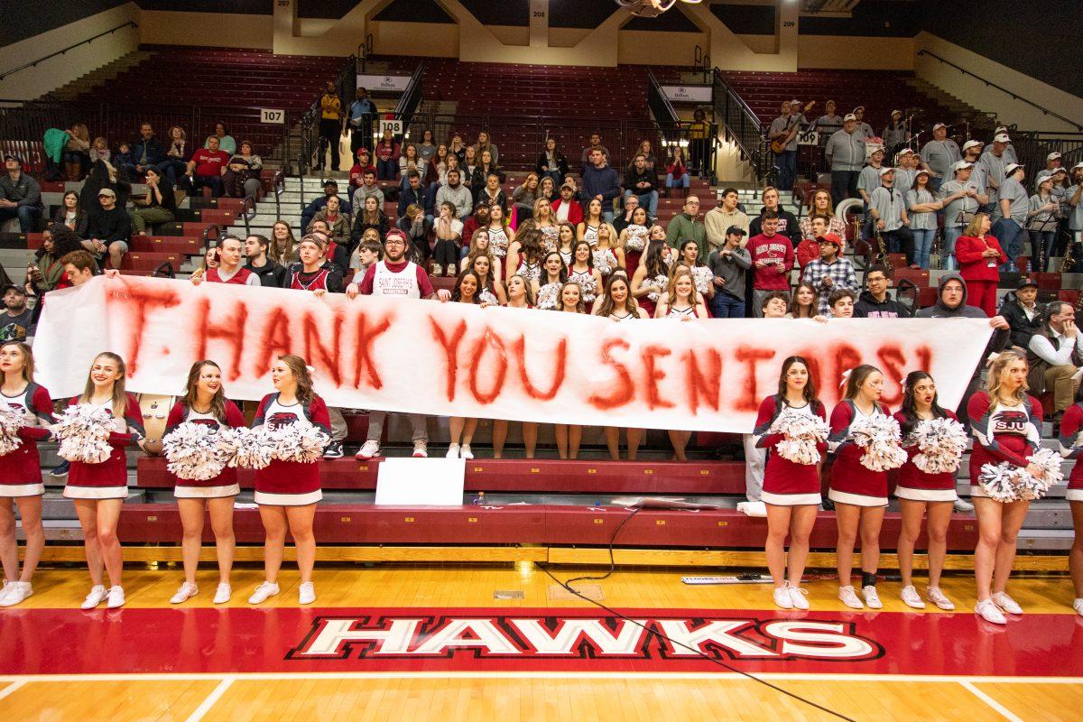 The student section sends a message to the senior class. Photo by Mitchell Shields 22