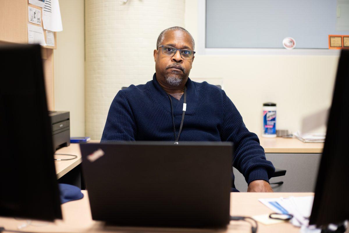 Michael Brooks, the Francis A. Drexel Library technology support coordinator, has published three books since 2012. PHOTO: MITCHELL SHIELDS  ’22/THE HAWK