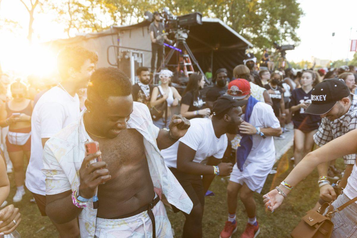 Fans dance to Young Thug on Saturday, Sept. 4. While the festival and city both mandated attendees to wear masks, those who complied were few and far between.