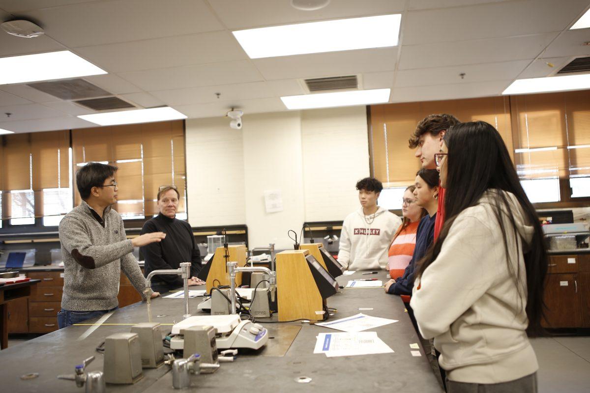 Pharmacy students discuss the results of their experiment on the
University City campus with pharmacy faculty and Control Ltd.
employee, Feb. 5. PHOTO: SAHR KARIMU ’26/THE HAWK
