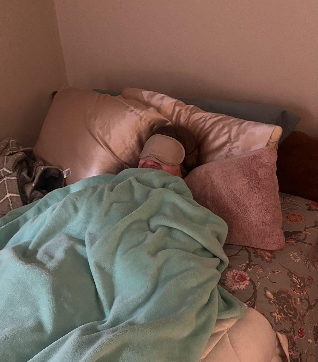 Emma McFarlane ’24 lays in bed and takes her daily
30-minute nap. PHOTO COURTESY OF
EMMA MCFARLANE ’24