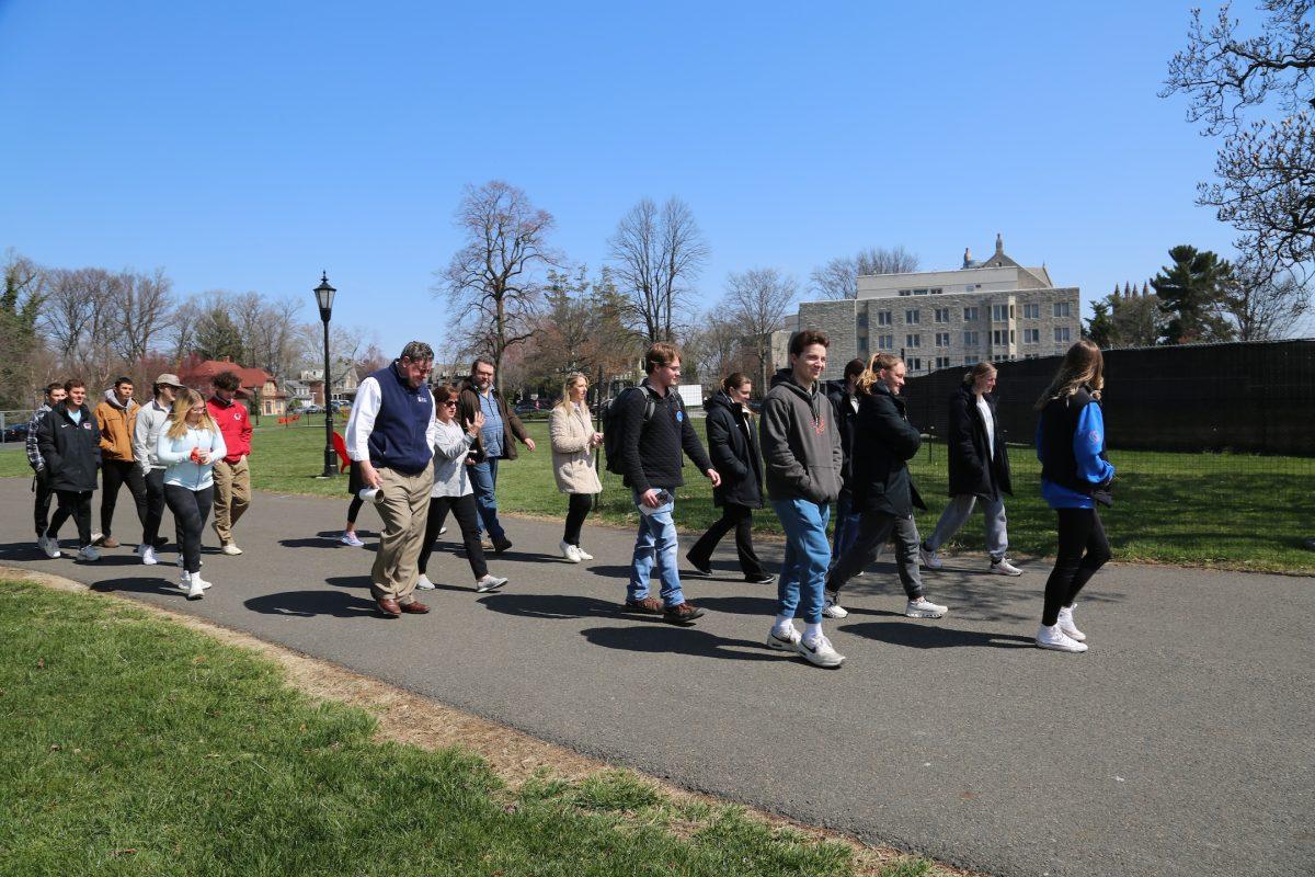 Participants walking as part of the Magis for Maji Walk, March 22.