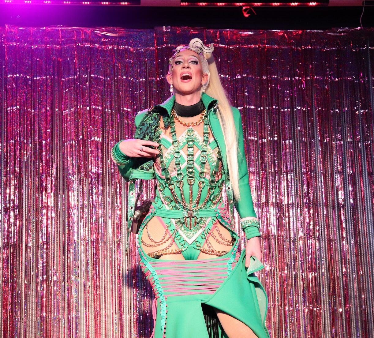 Photo of Drag queen Missshell performing her second set of the night at the drag show.