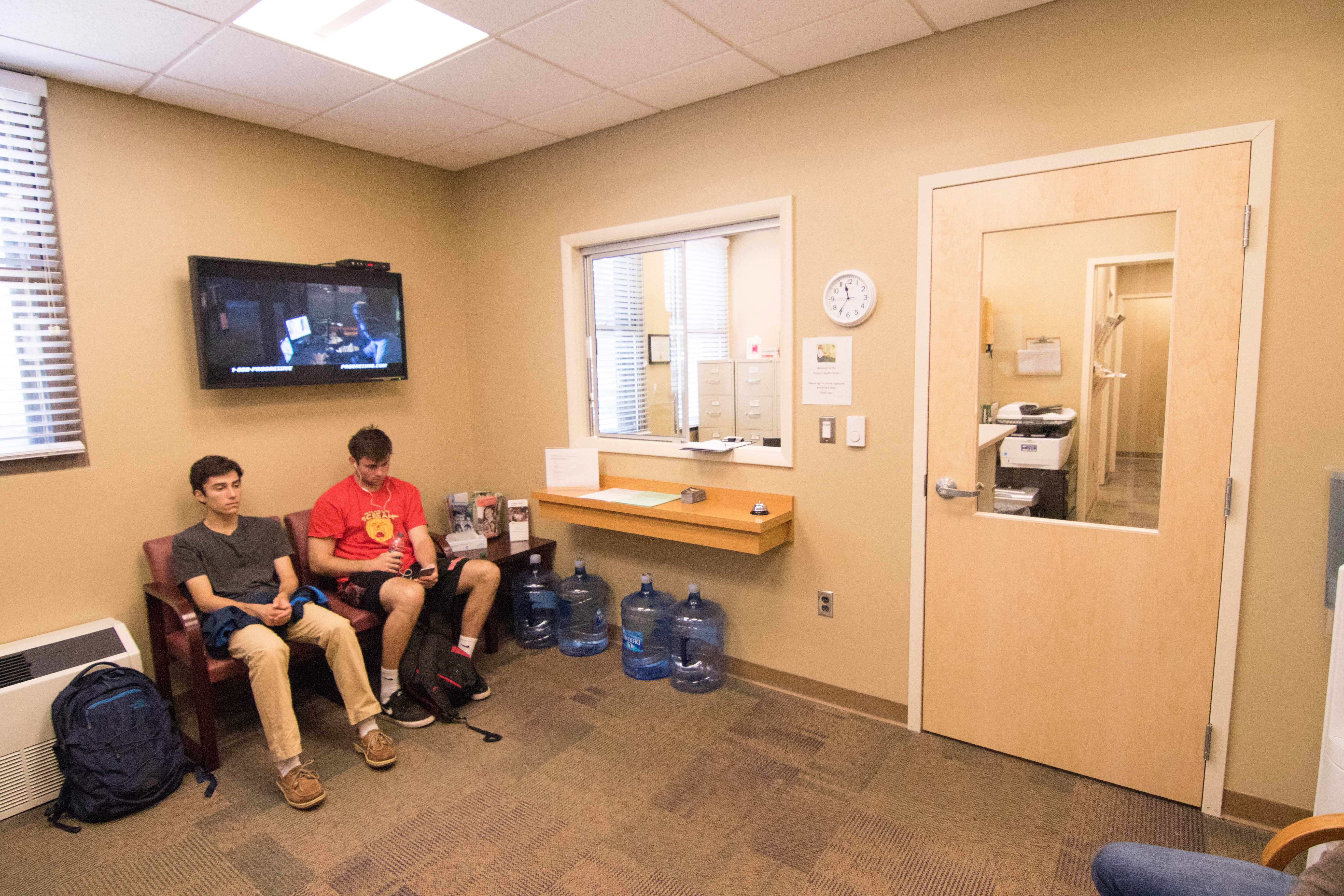 Students sit in the renovated waiting room of the Student Health Center (Photo by Luke Malanga, '20)