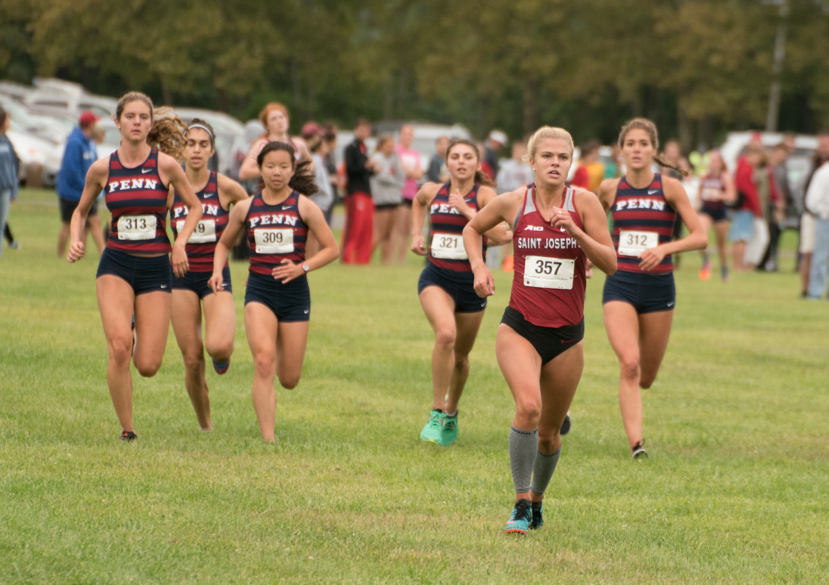 Lindsey Oremus trailed by Penn runners (Photo courtesy of Bill Shearn).