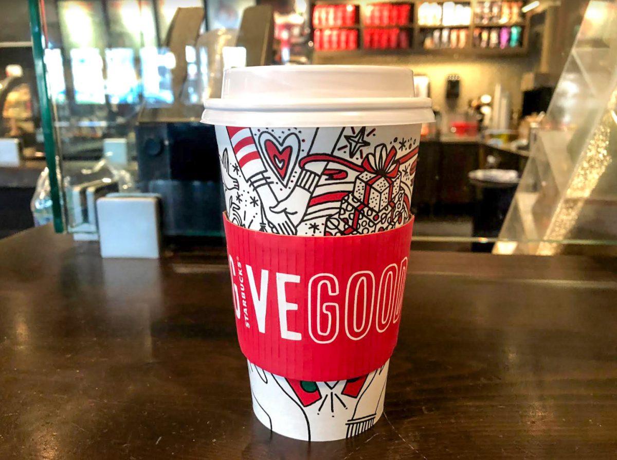 Starbucks new holiday cup with Give Good sleeve (Photo by Alyssa Thompson 19).