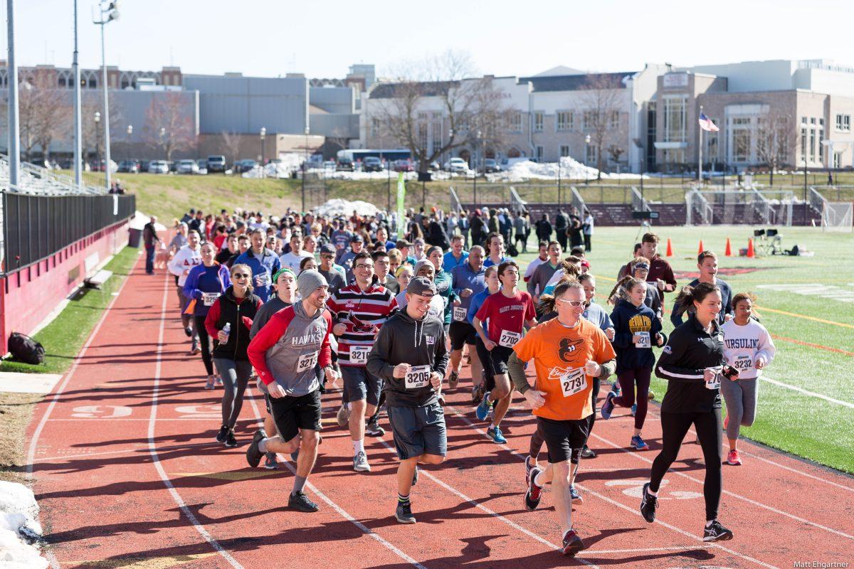 Participants start the Casey 5K on the Sweeney Field track (Photos by Matthew Ehgartner ’20). 