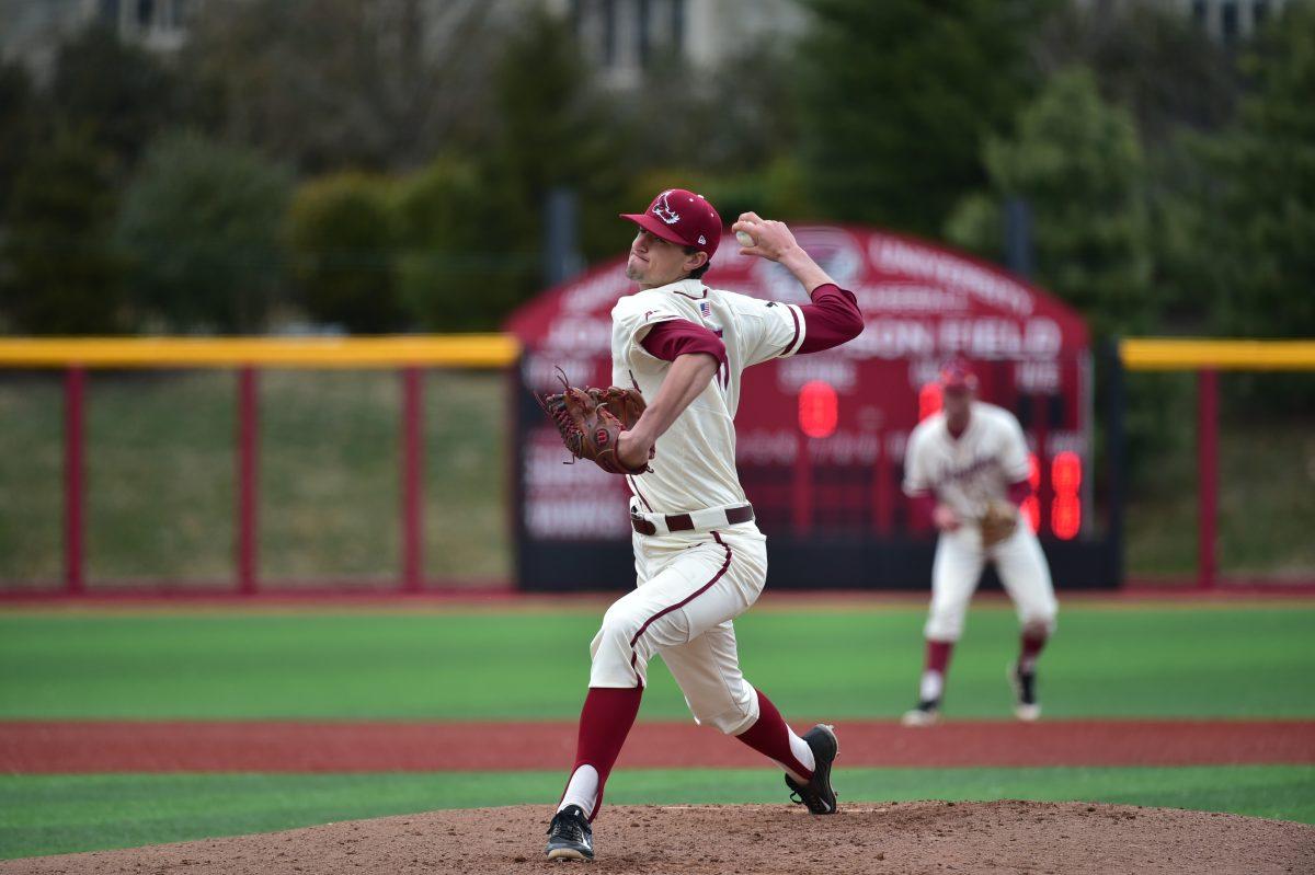 Tim Brennan winds up for a pitch (Photo courtesy of SJU Athletics).