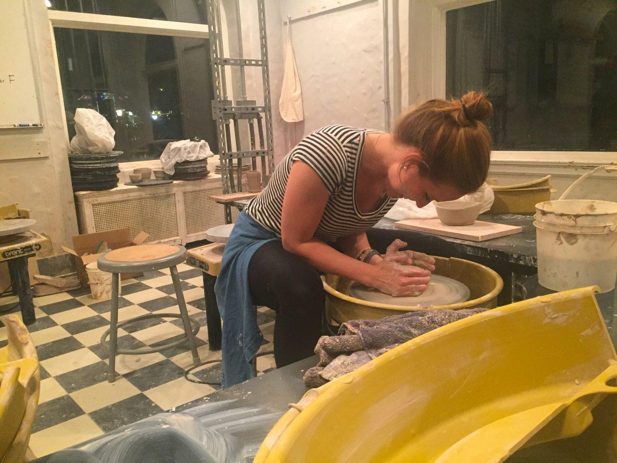 Bridget Gilmore ’18 works on making a cereal bowl in the ceramics room (Photo by Brendan Kiley ’19). 