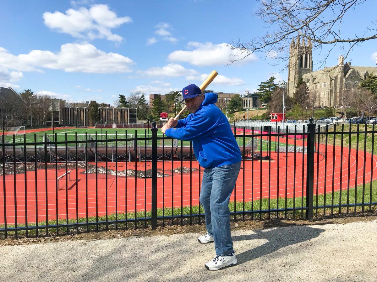 John Lord, Ph.D., showing off his batting stance (Photo by Brianna Genello ’19). 