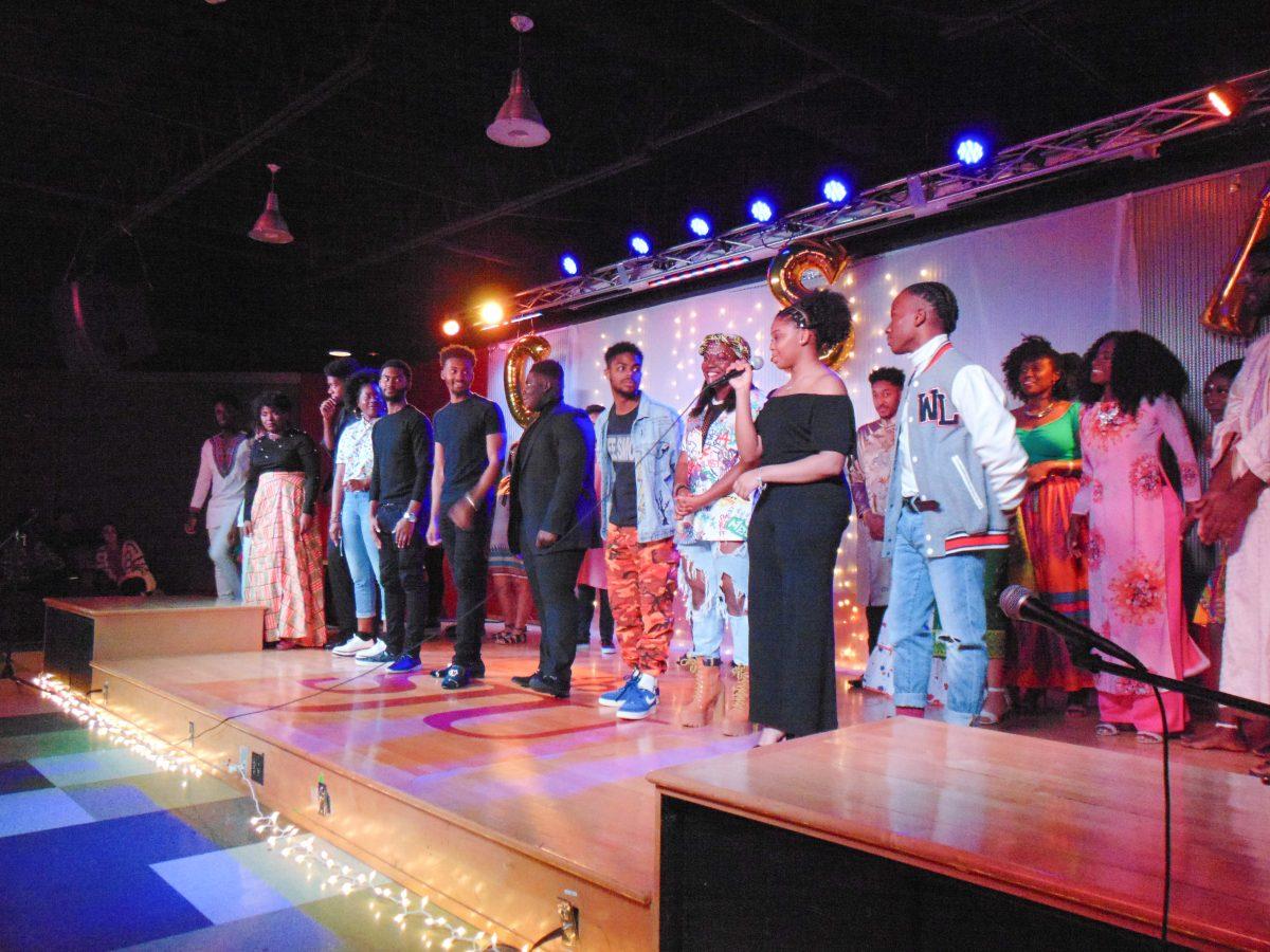 Participants of the fashion show on stage during the finale (Photo by Cherissa Allan ’18). 