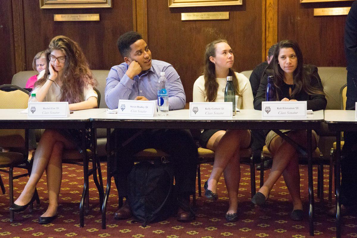 Rachel Cox '19, Steven Bradley '20, Kelly Corbett '21 and Kali Elfstration '21 during a Senate meeting (Photo by Luke Malanga '20).