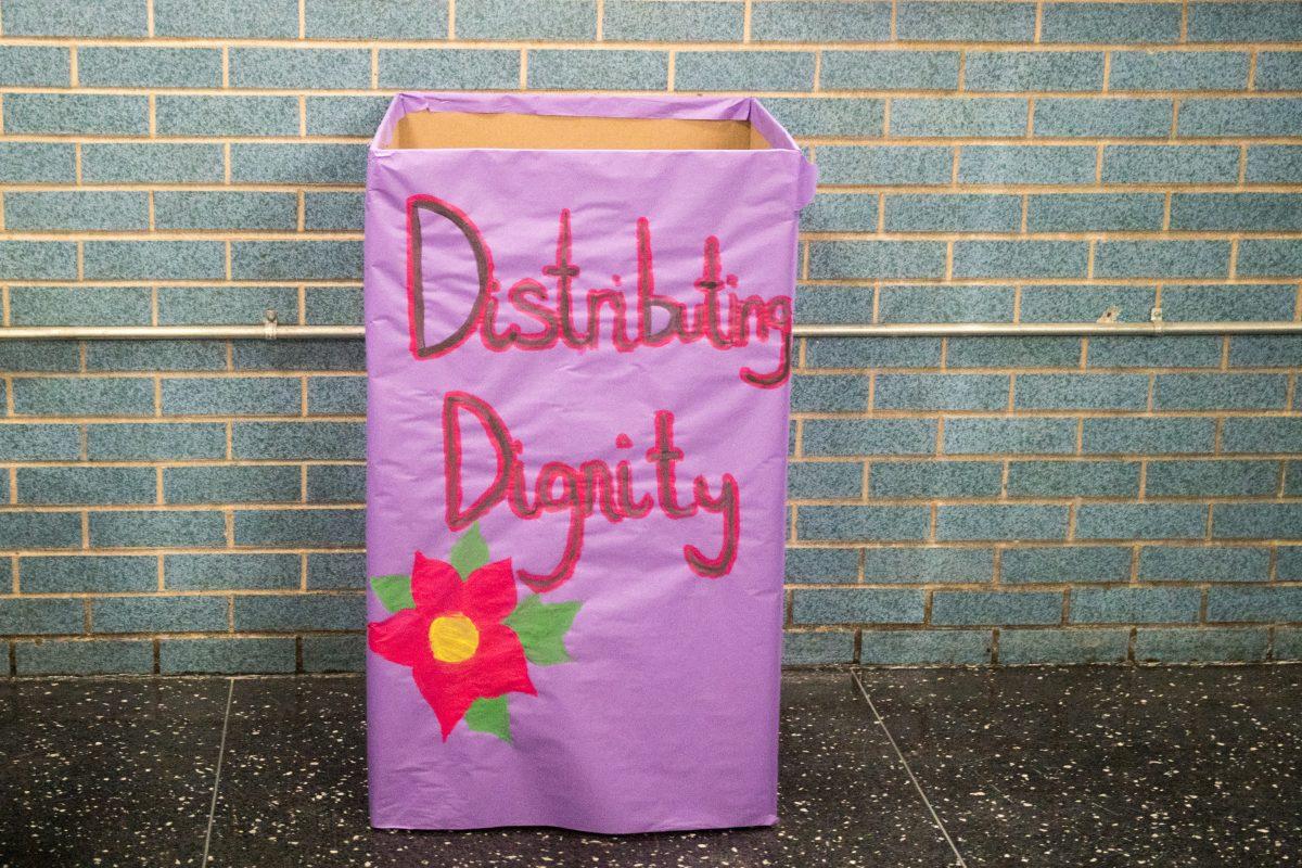 A Distributing Dignity collection box in Campion Student Center (Photo by Matt Barrett ’21).