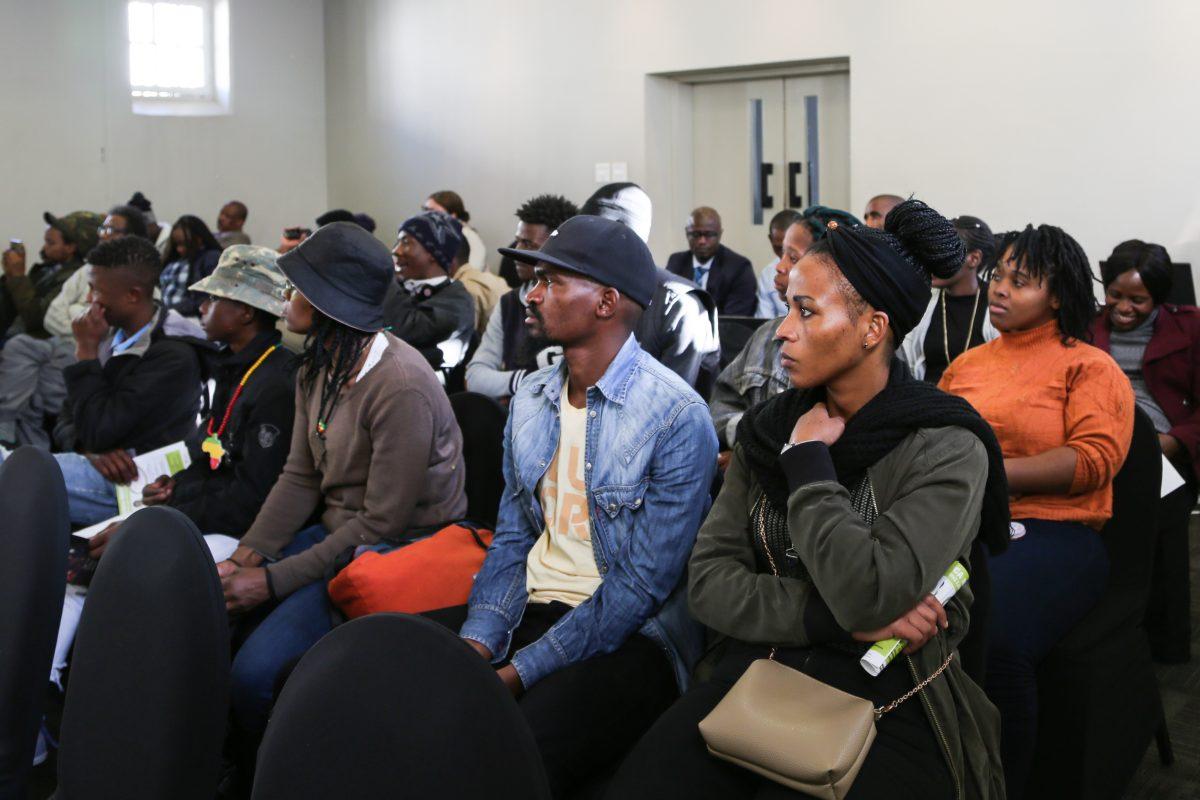 Audience listens to speakers at Building a Better Africa and a Better World colloquium in Johannesburg.