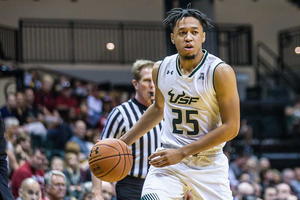 Troy Holston Jr. playing for the University of South Florida (Photo courtesy of USF Athletics).