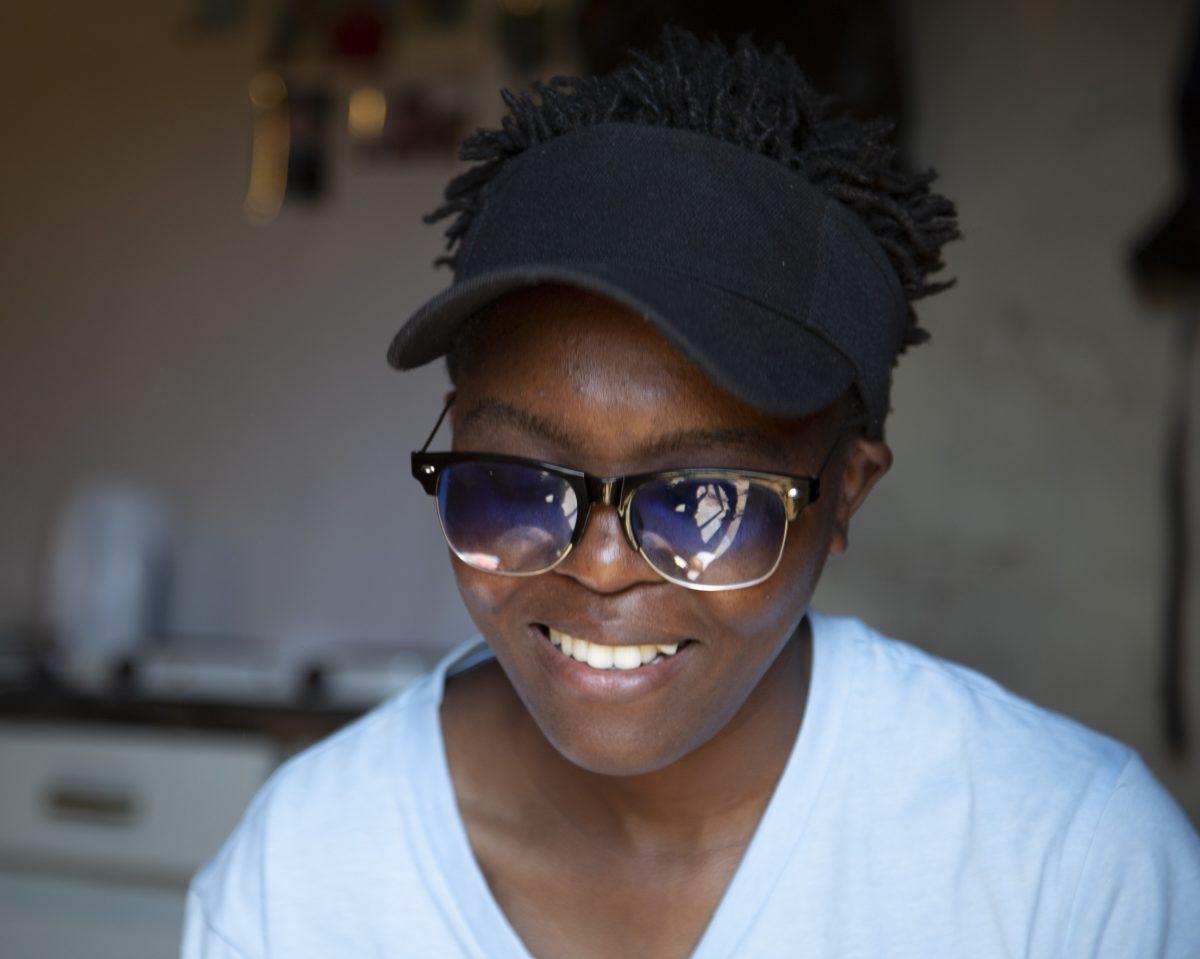 Lebo Tshoma, an LGBTQ activist and entrepreneur, runs a small printing and design business in Kwa-Thema township east of Johannesburg. Photo by Alim Young 19