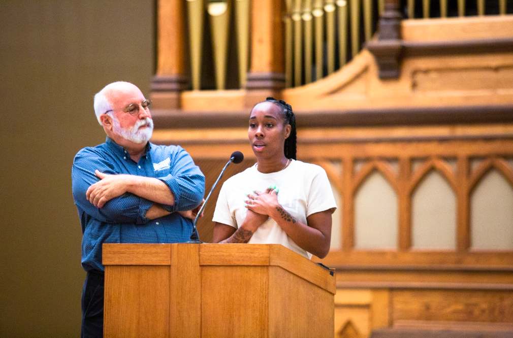 Greg Boyle, S.J., listens as Sharnise Simmons speaks about her experiences with Homeboy Industries (Photo by Luke Malanga 20).