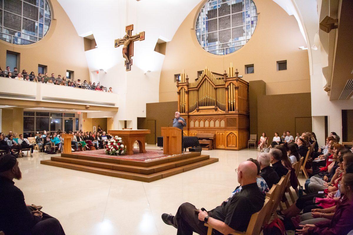 Greg Boyle, S.J., speaks to a full house at the Chapel of Saint Joseph on the evening of Sept. 12 (Photos by Luke Malanga ’20).