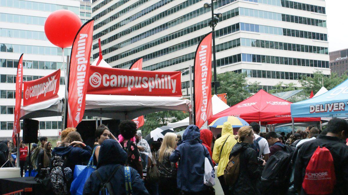 Students walk through Dilworth Park at the start of CollegeFest (Photo by Emily Graham ’20).