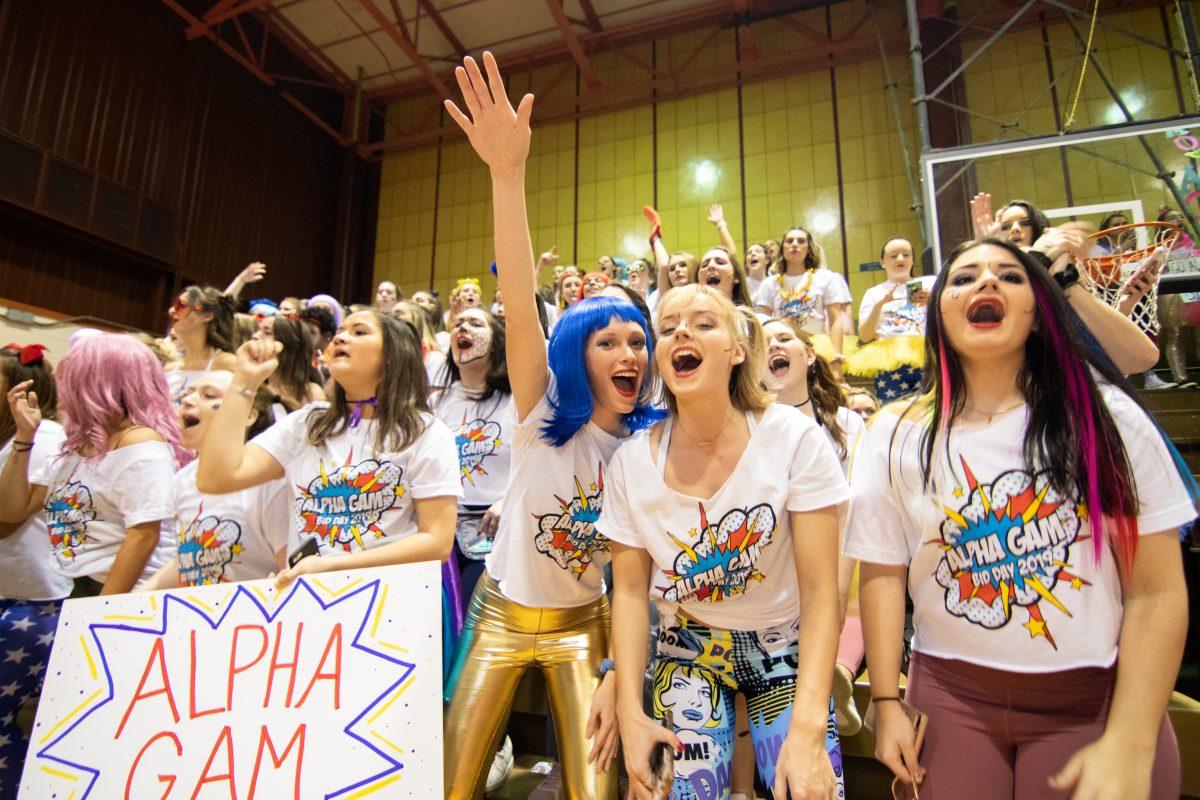 Alpha Gamma Delta sisters cheer in O'Pake Recreation Center. 
PHOTOS: MITCHELL SHIELDS ’22/THE HAWK