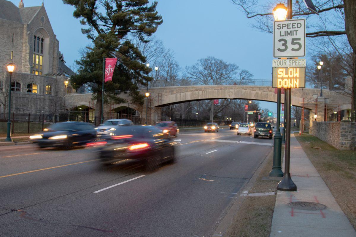 Cars pass the updated speed limit sign on City Avenue. 
PHOTOS:
MITCHELL SHIELDS '22/THE HAWK