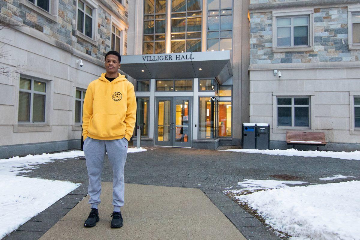 Khalil Thames '21 outside Villiger Residence Hall. PHOTO: MITCHELL SHIELDS '22/THE HAWK