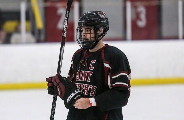 Senior Captain Andrew Sarre takes the ice in an early season game. PHOTO COURTESY OF BILL GERKE