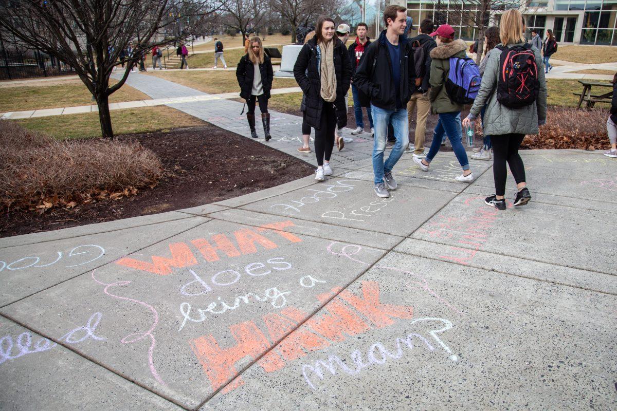 Mission Week chalk writing outside Campion Student Center. PHOTOS: MITCHELL SHIELDS 22/THE HAWK