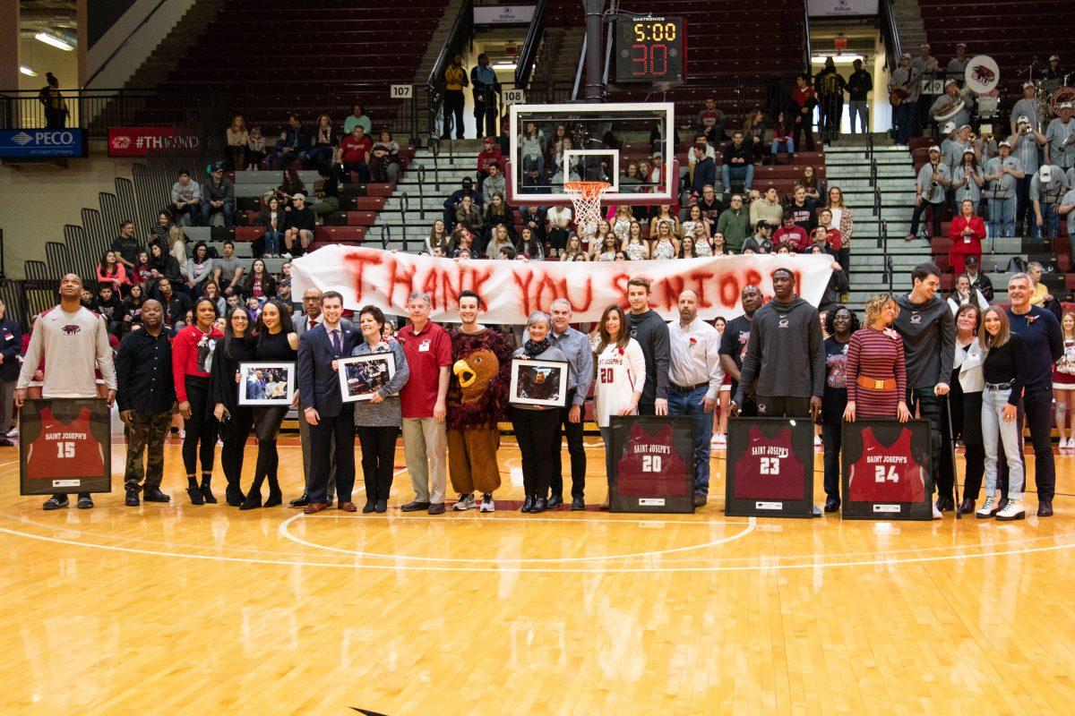 St. Joes mens basketball seniors celebrate Senior Day after beating La Salle University 72-62 on March 2. PHOTOS: MITCHELL SHIELDS 22/THE HAWK
