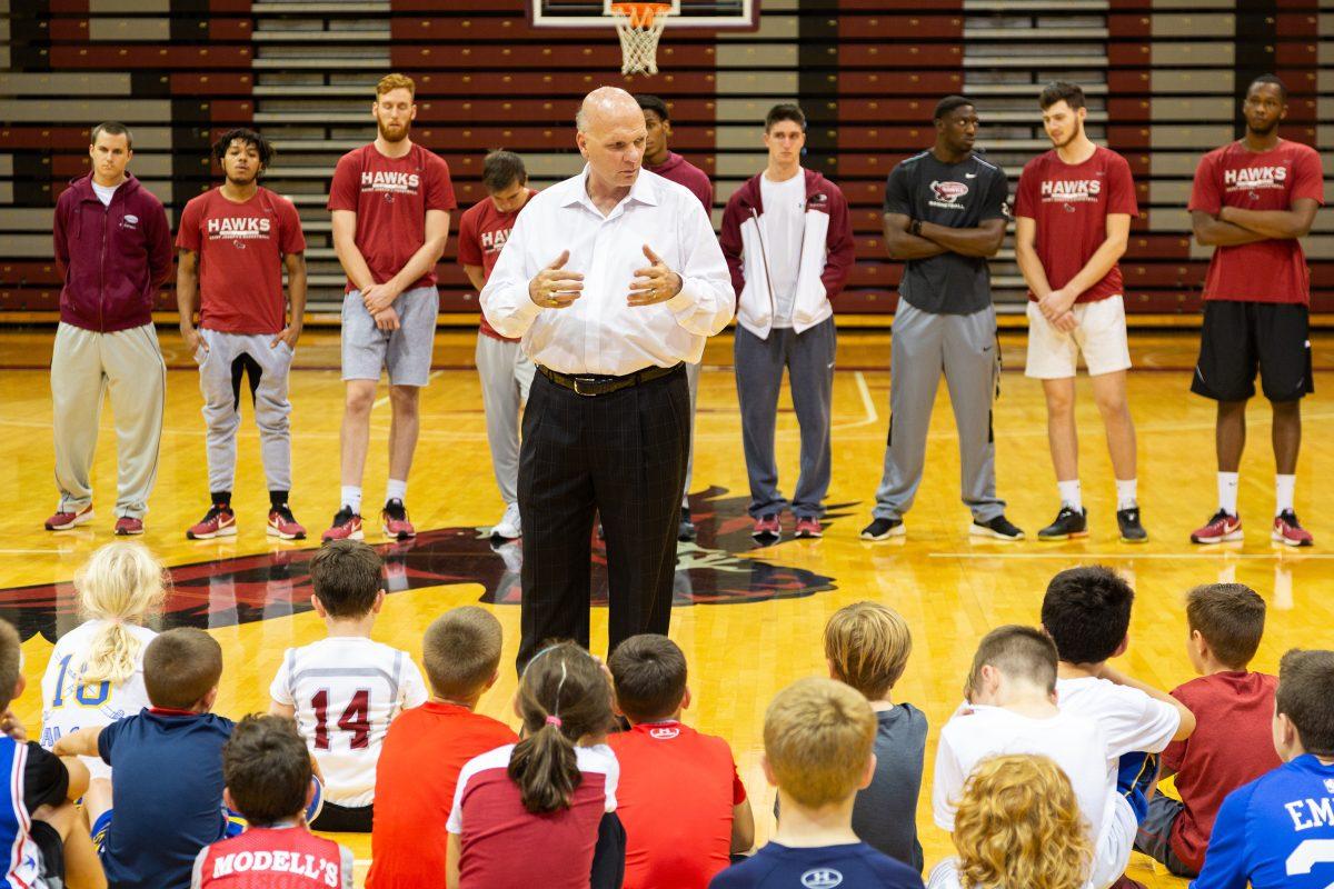 Phil Martelli speaks during the youth clinic at the 2017 Family Night, an event held for season ticket holders and their families. PHOTO: LUKE MALANGA ’20 /THE HAWK