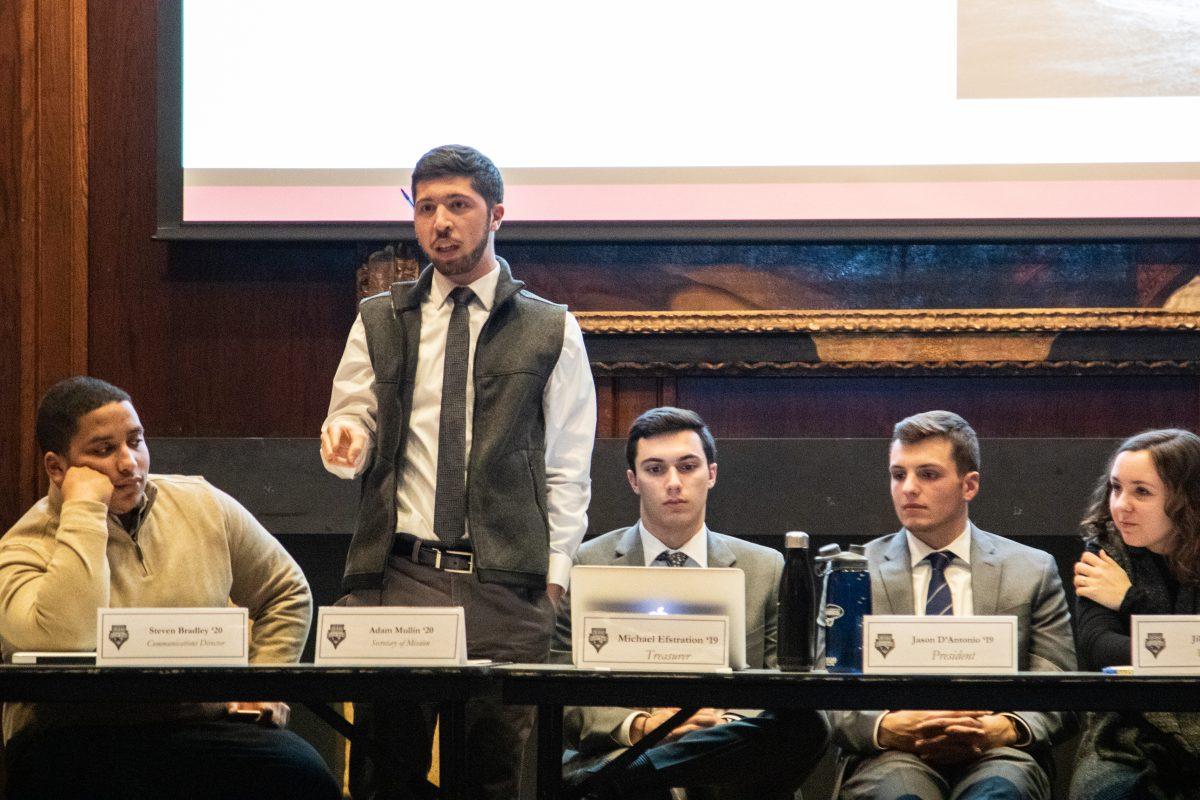 Adam Mullin '20 speaks at a January 14 University Student Senate meeting. PHOTO: MITCHELL SHIELDS '22/THE HAWK