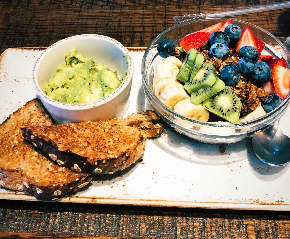 A healthy breakfast selection of avocado toast and an acai bowl at First Watch. PHOTO: GAIL  PODLESNY ’20