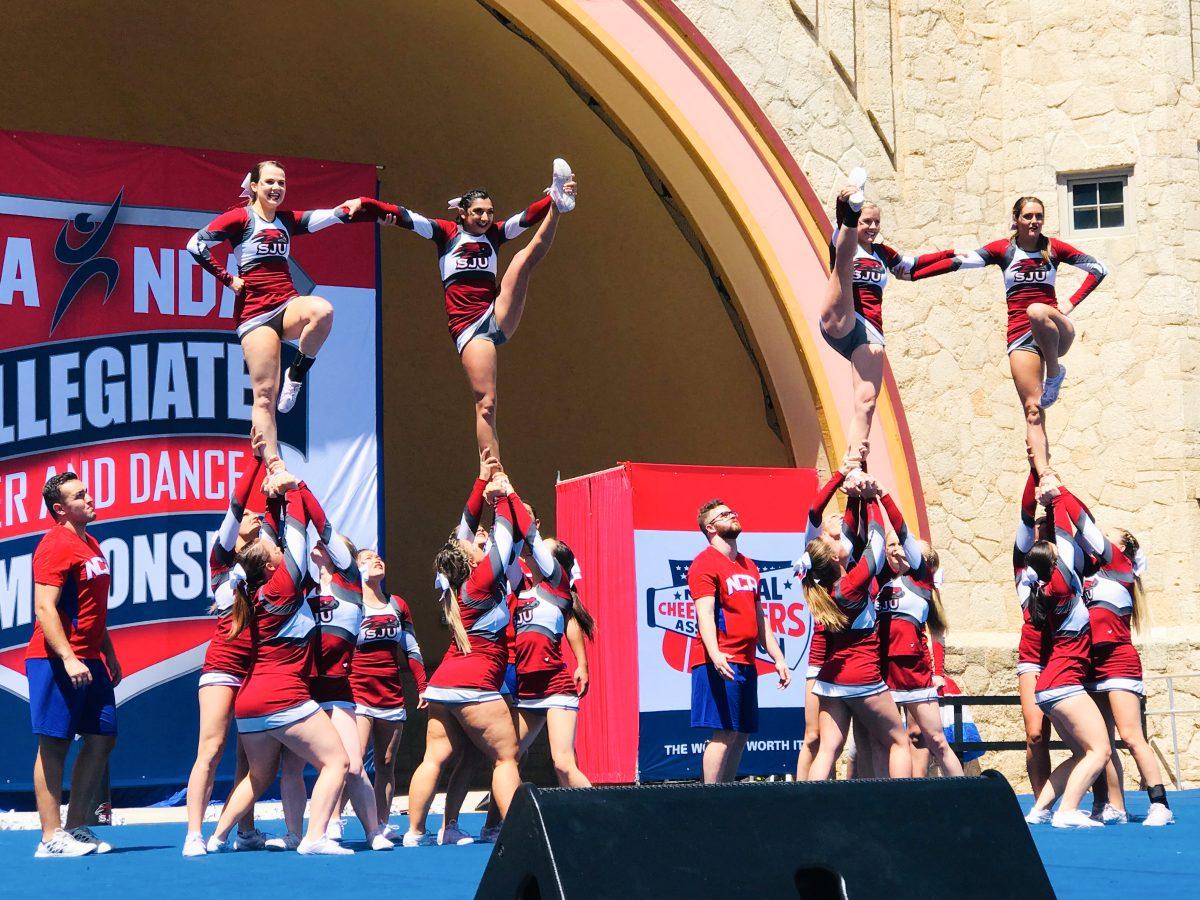 The+St.+Joes+cheerleading+team+competed+in+two+rounds+to+win+the+NCA+championship.+PHOTOS+courtesy+OF+SJU+CHEERLEADING