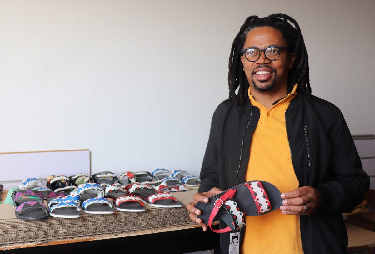 Reggie Xaba, founder and managing director of the ZETU footwear company, designs African-themed shoes now sold in South Africa, Europe and North America. PHOTO: Sarah Harwick 21.