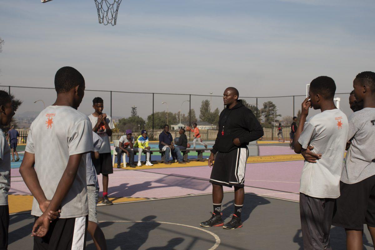 Monwabisi Dlamini, known as Coach Mo to his players, co-founded the Soweto Basketball Academy as a way to improve school performance and attendance through the sport of basketball. PHOTO: Sarah Harwick 21
