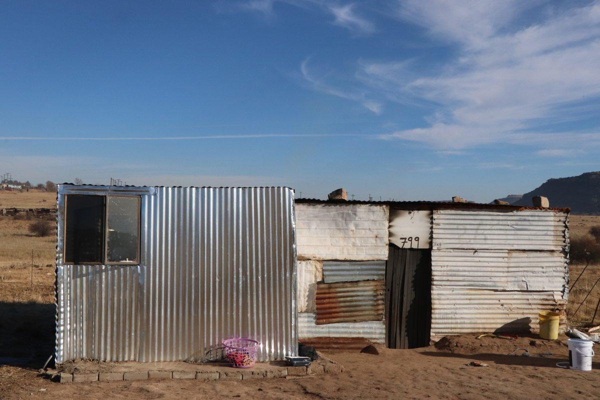 An new extension to an existing zinc shack, built by Project Nkgono volunteers. Photo: Alex Vadaketh 22  