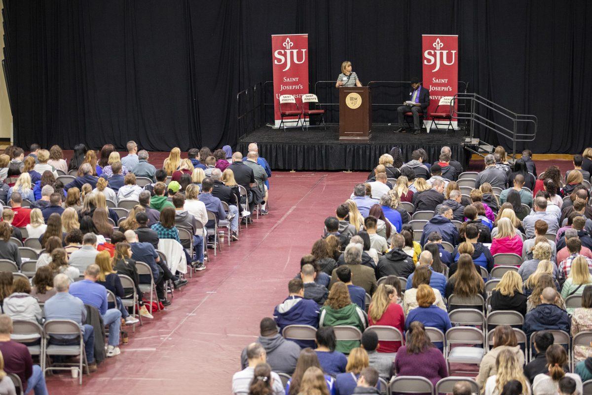 Prospective parents and students listen to Maureen Mathis, director of undergraduate admissions, speak at the spring 2019
open house. PHOTO: Mitchell Shields 22