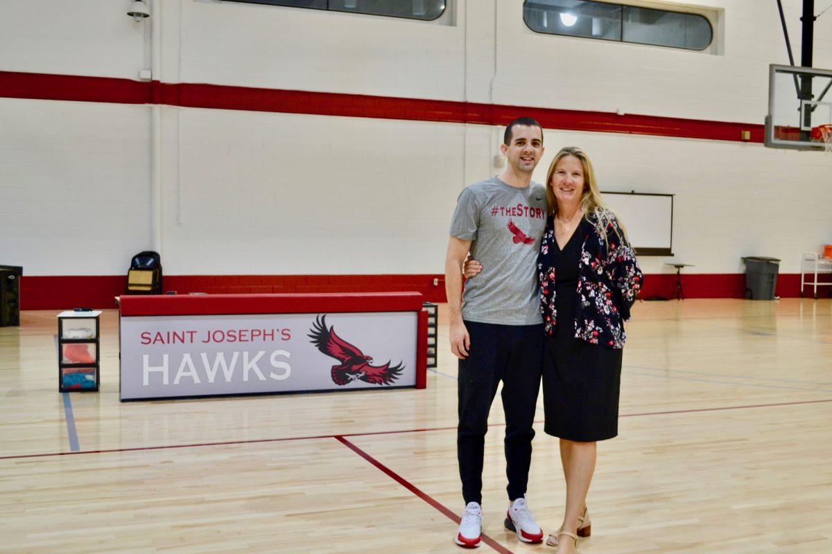 Kathleen Campbell Garwood and Thomas Boyle, the St. Joe’s men’s basketball director of scouting and analytics. PHOTO: Leslie Quan ’22