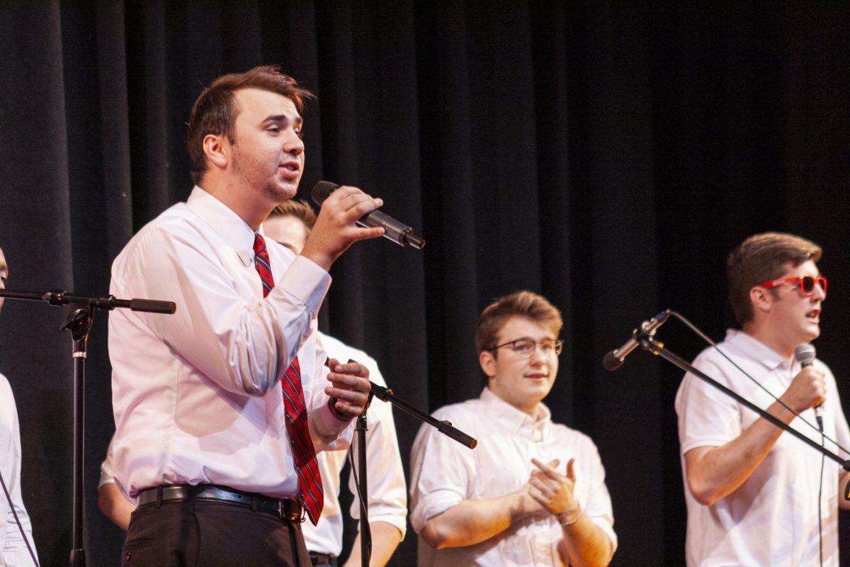 Christian Peeney ’22, music director of 54th and City, performs during his group’s performance of Stacys Mom originally by Fountains of Wayne. PHOTOS: ZACH DOBINSON 22/THE HAWK