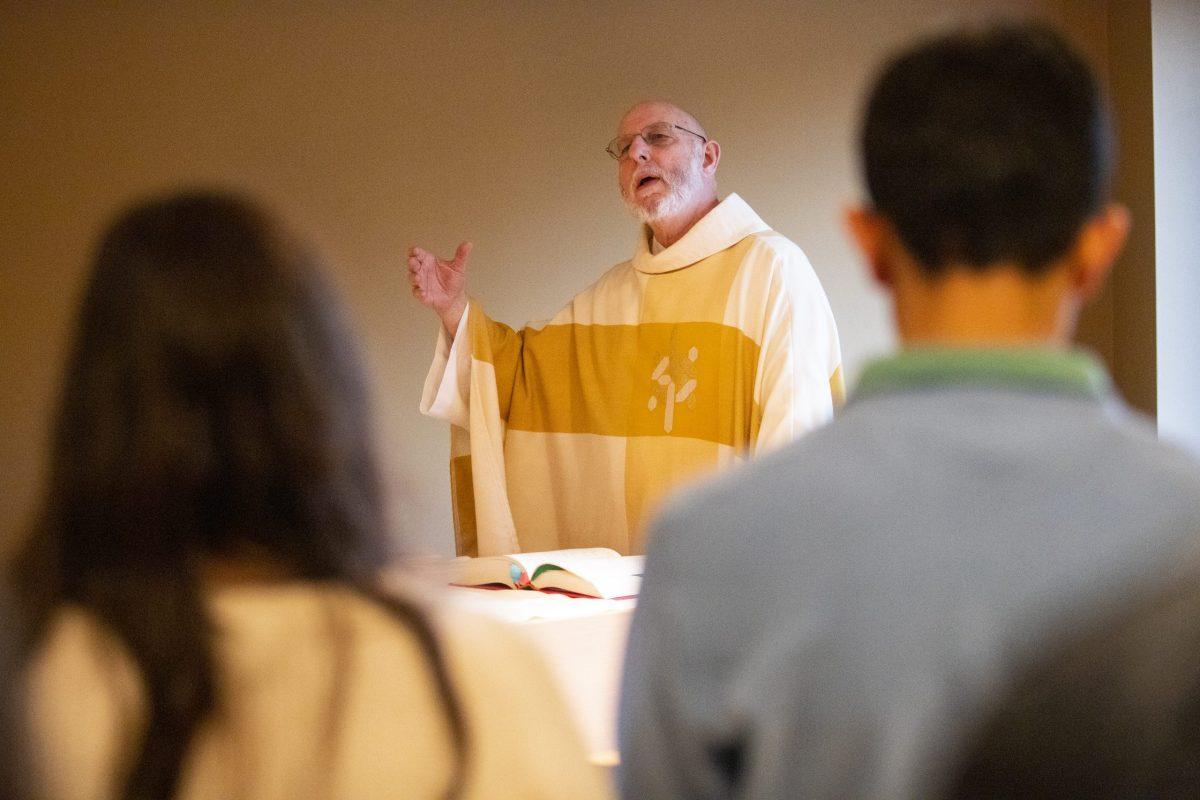 Bill Rickle, S.J., said the Mass in the smaller chapel within the Chapel of St. Joseph. PHOTOS: MITCHELL SHIELDS ’22/THE HAWK