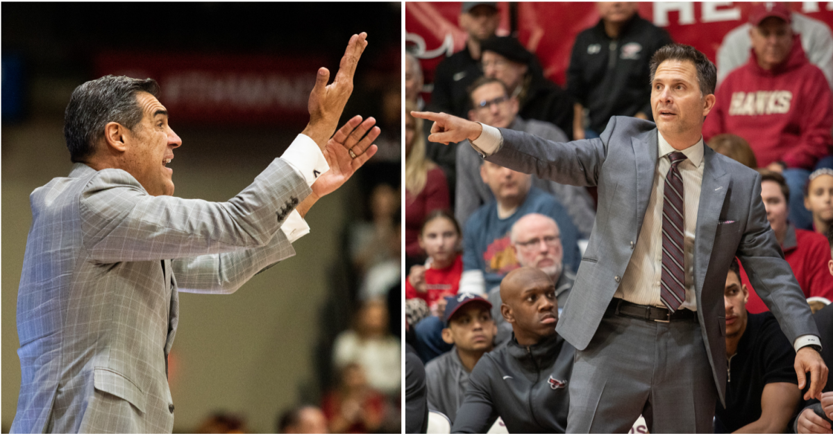 Villanova University men’s basketball coach Jay Wright (left) and St. Joe’s men's basketball coach Billy Lange (right) command their teams from the sideline. PHOTOS: MITCHELL SHIELDS ’22/THE HAWK