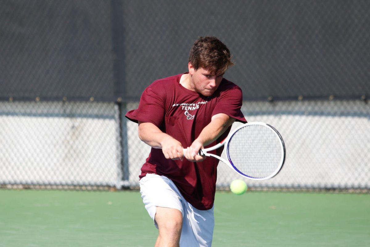 Juniors Nathan Perrone and Johnnie Massart were the only Hawks to win both their doubles and singles matches. PHOTOS: LUKE MALANGA ’20/THE HAWK