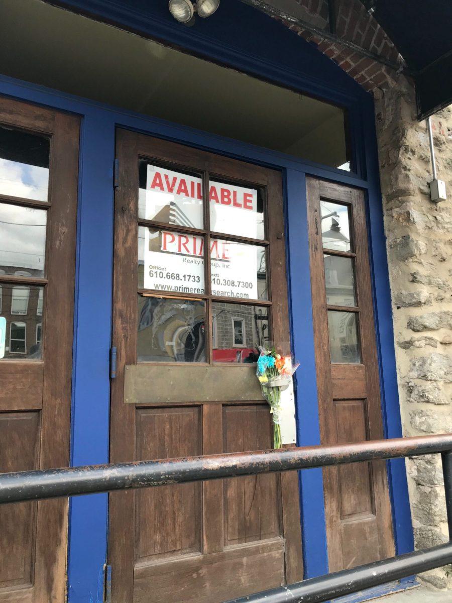 Flowers were left on the door of Mad River following the announcement of its closing. PHOTOS: RYAN MULLIGAN 21/THE HAWK