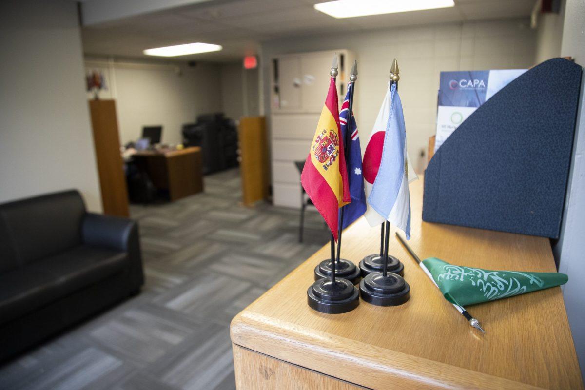 World flags stand in the corner of the CIP office in LaFarge Hall. PHOTO: MITCHELL SHIELDS 22/THE HAWK