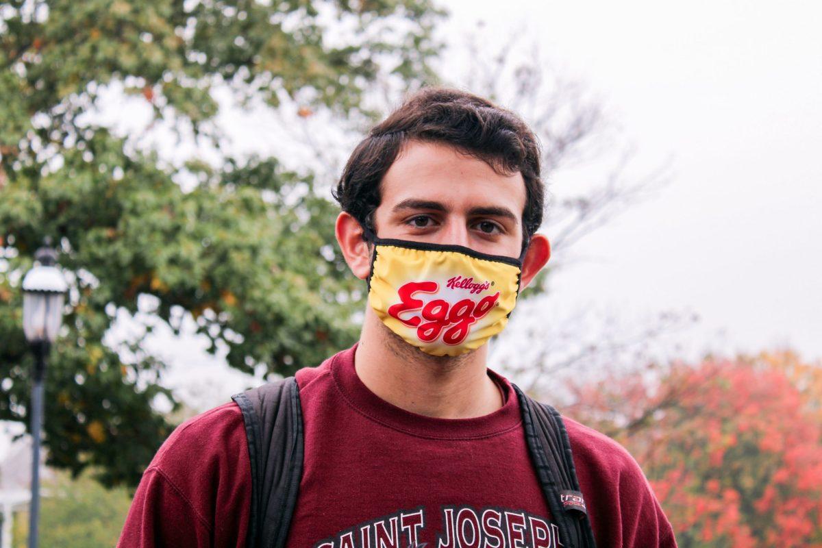 Thomas Francesconi ’22 wears his Kellogg’s Eggo mask around campus.  PHOTO: ELAINA WALL ’21/THE HAWK