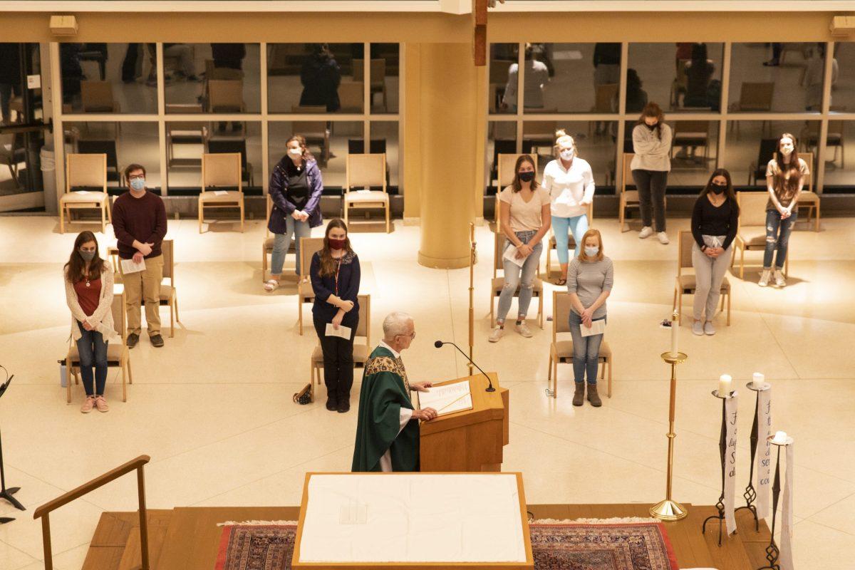 Attendees in the Chapel of Saint Joseph are stationed six feet apart in a modified Mass layout. PHOTOS: MITCHELL SHIELDS ’22/THE HAWK